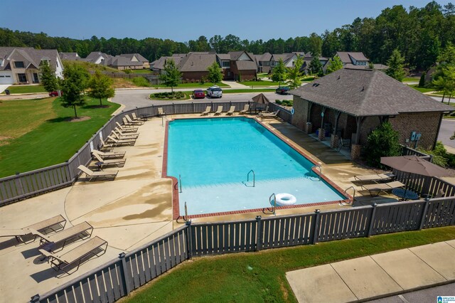 2994 Kelham Grove Way, Birmingham, AL 35242 - community pool featuring a residential view, view of wooded area, and a patio area