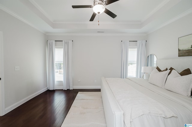 2167 Springfield Dr, Chelsea, AL 35043 - bedroom featuring dark wood-style floors, a tray ceiling, and multiple windows
