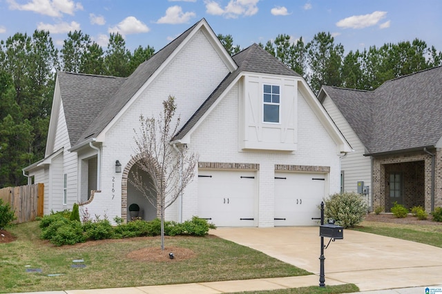 2167 Springfield Dr, Chelsea, AL 35043 - view of front of home with driveway, brick siding, and a shingled roof