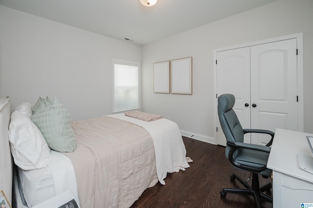 2167 Springfield Dr, Chelsea, AL 35043 - bedroom with baseboards, visible vents, a closet, and wood finished floors