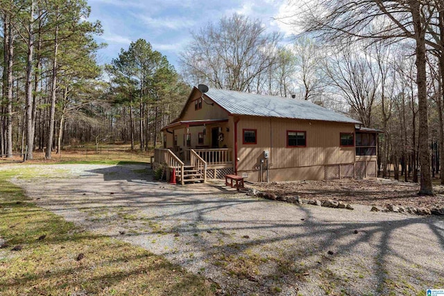 rustic home with metal roof