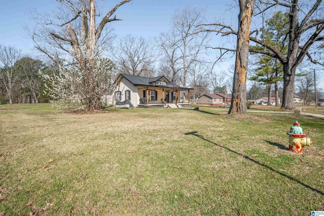 1109 Central Ave, Gadsden, AL 35904 - view of front of property with a front yard and covered porch