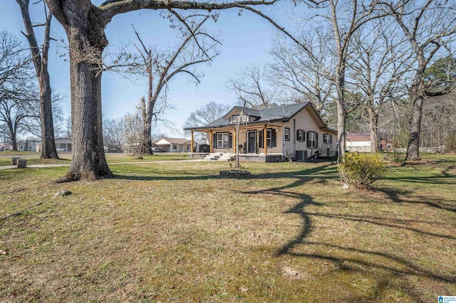 1109 Central Ave, Gadsden, AL 35904 - exterior space with a lawn and a porch