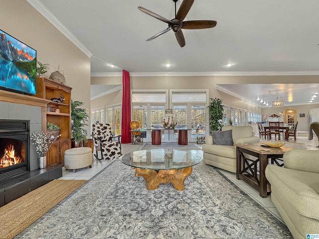 385 Rouse Rd, Sumiton, AL 35148 - living area with tile patterned flooring, ornamental molding, a tile fireplace, and ceiling fan