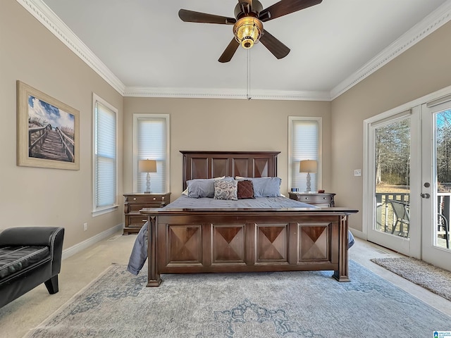 385 Rouse Rd, Sumiton, AL 35148 - bedroom with a ceiling fan, baseboards, ornamental molding, access to exterior, and light carpet