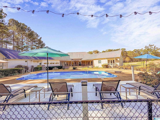 385 Rouse Rd, Sumiton, AL 35148 - view of pool featuring a fenced in pool, fence, and a patio area