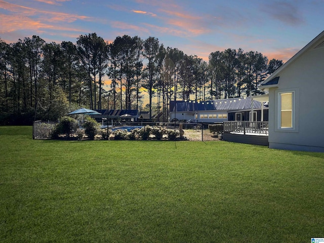 385 Rouse Rd, Sumiton, AL 35148 - yard at dusk with a fenced in pool