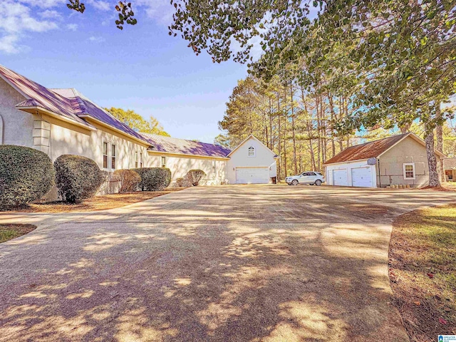 385 Rouse Rd, Sumiton, AL 35148 - view of yard featuring a garage