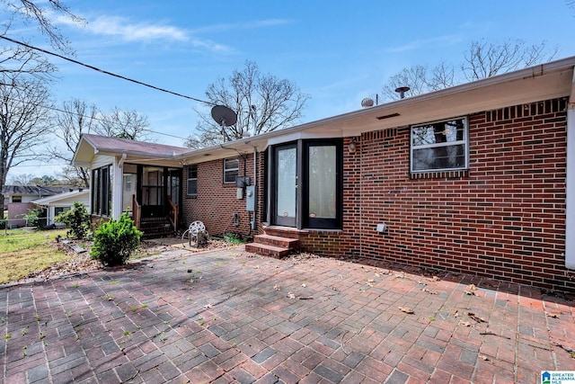 817 Milgray Ln, Bessemer, AL 35022 - rear view of house featuring entry steps and brick siding