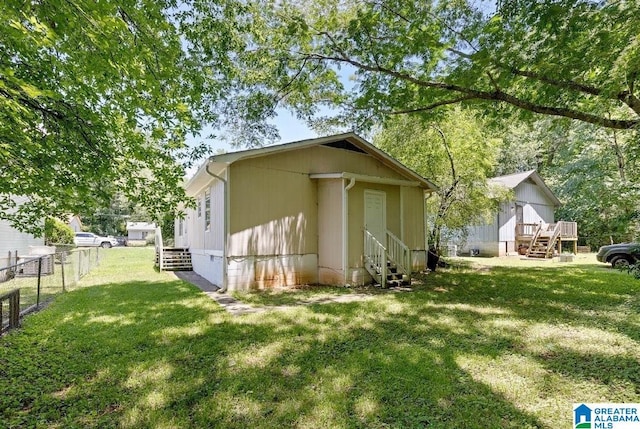 63 Bluebell St, Bessemer, AL 35020 - view of outdoor structure with entry steps and fence