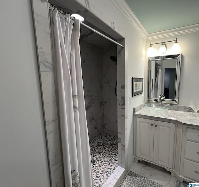 bathroom featuring a marble finish shower, marble finish floor, vanity, and crown molding