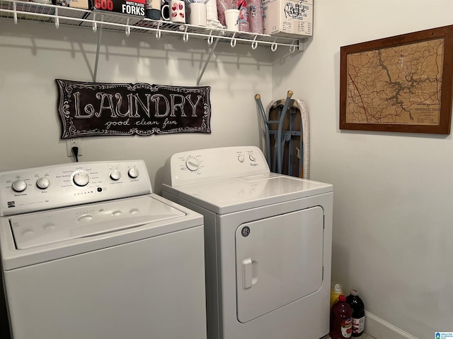 laundry area featuring laundry area and separate washer and dryer