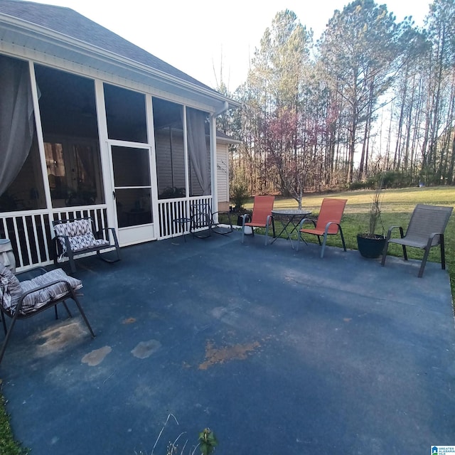 7459 15th Street Rd, Bessemer, AL 35023 - view of patio featuring a sunroom