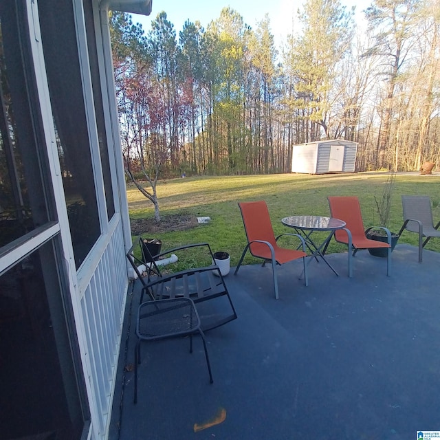 7459 15th Street Rd, Bessemer, AL 35023 - view of patio / terrace with an outbuilding and a shed