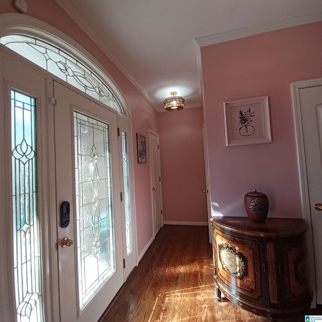 7459 15th Street Rd, Bessemer, AL 35023 - foyer entrance featuring wood finished floors, baseboards, a wealth of natural light, and ornamental molding