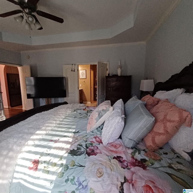 7459 15th Street Rd, Bessemer, AL 35023 - bedroom featuring ceiling fan, a tray ceiling, and ornamental molding