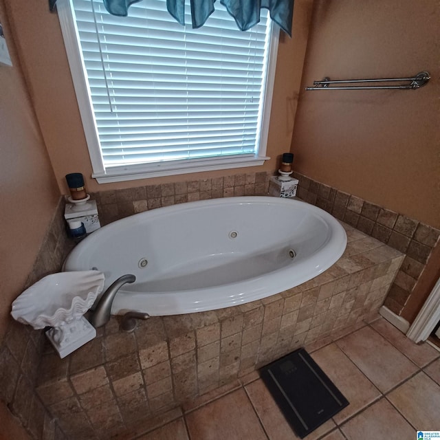 7459 15th Street Rd, Bessemer, AL 35023 - bathroom featuring tile patterned floors and a tub with jets