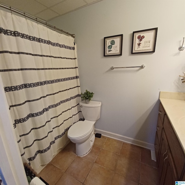 7459 15th Street Rd, Bessemer, AL 35023 - bathroom featuring vanity, a shower with curtain, baseboards, tile patterned floors, and toilet