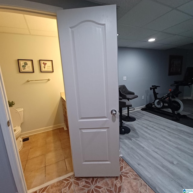 7459 15th Street Rd, Bessemer, AL 35023 - workout area featuring baseboards, a paneled ceiling, and tile patterned flooring
