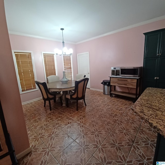 7459 15th Street Rd, Bessemer, AL 35023 - dining space featuring an inviting chandelier, crown molding, and baseboards