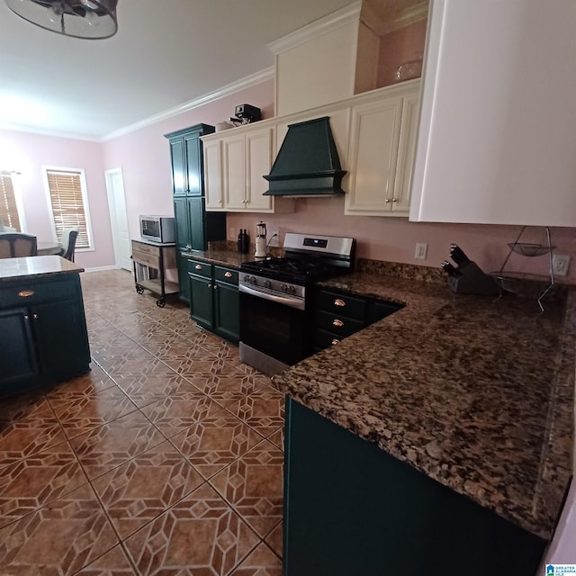 7459 15th Street Rd, Bessemer, AL 35023 - kitchen with custom exhaust hood, ornamental molding, stainless steel appliances, white cabinets, and tile patterned floors