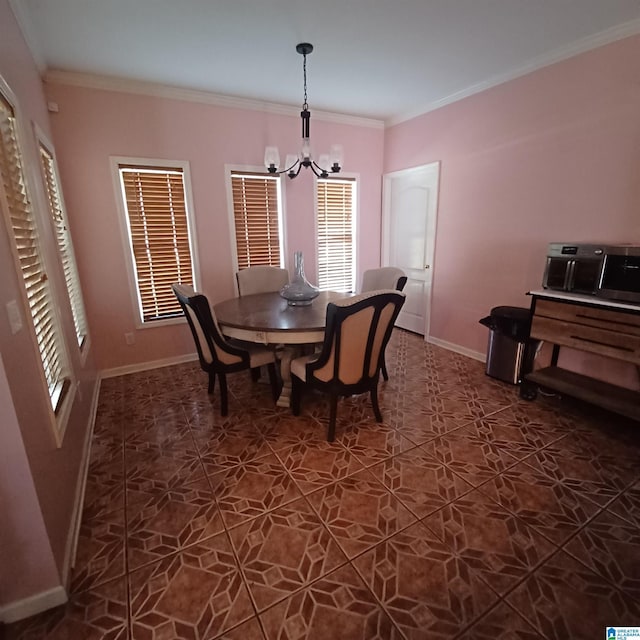 7459 15th Street Rd, Bessemer, AL 35023 - dining space featuring crown molding, baseboards, and a chandelier