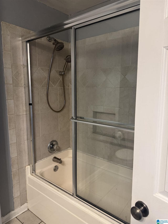 1804 Ragsdale Rd, Cullman, AL 35055 - full bathroom with tile patterned floors and bath / shower combo with glass door