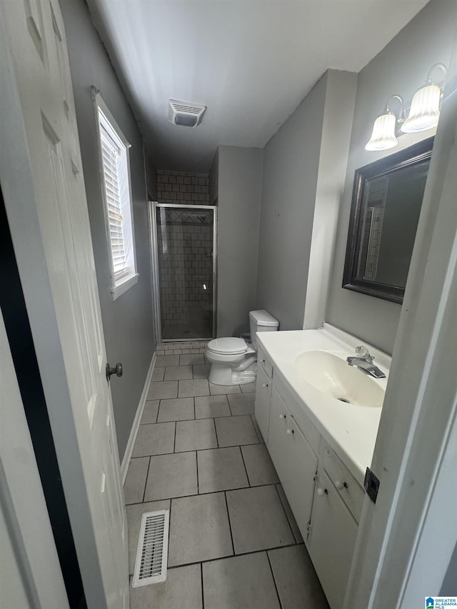1804 Ragsdale Rd, Cullman, AL 35055 - full bath featuring tile patterned floors, visible vents, a stall shower, and vanity
