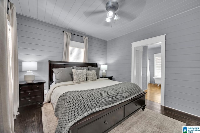 bedroom featuring wood ceiling, a ceiling fan, and wood finished floors