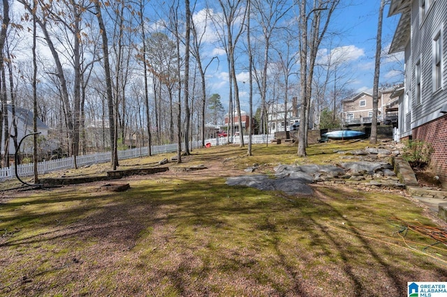 view of yard with fence