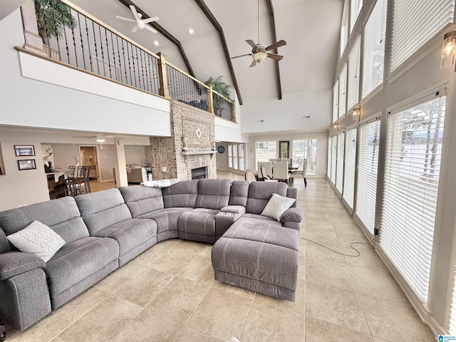 360 Frankies Rd, Vincent, AL 35178 - tiled living room featuring a fireplace, high vaulted ceiling, and ceiling fan
