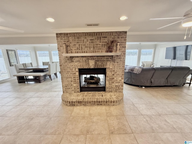 360 Frankies Rd, Vincent, AL 35178 - living room with ceiling fan, visible vents, a healthy amount of sunlight, and crown molding