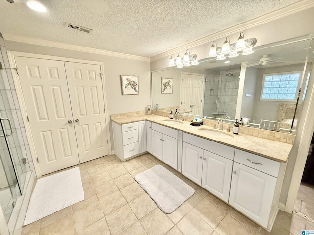 360 Frankies Rd, Vincent, AL 35178 - bathroom featuring a shower stall, visible vents, crown molding, and a textured ceiling