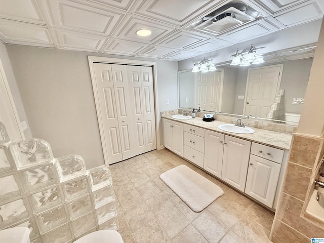 360 Frankies Rd, Vincent, AL 35178 - bathroom featuring double vanity, a sink, and an ornate ceiling