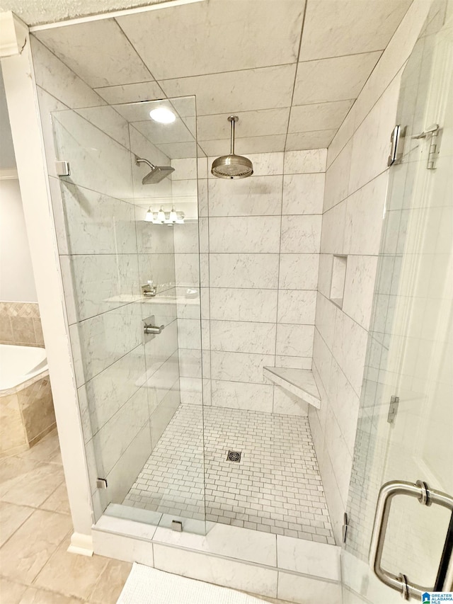 360 Frankies Rd, Vincent, AL 35178 - bathroom featuring a shower stall and a garden tub