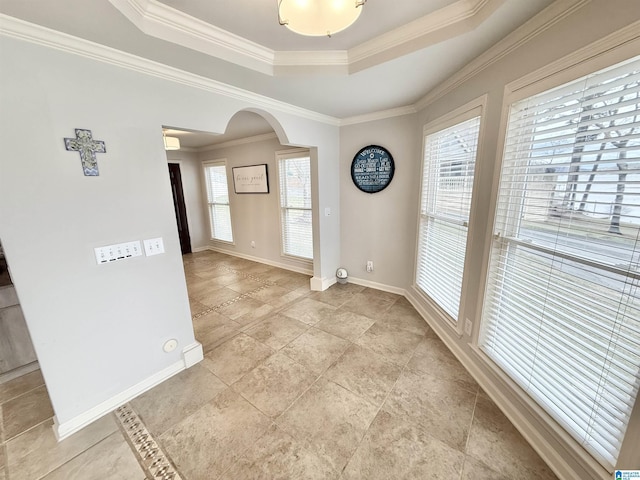360 Frankies Rd, Vincent, AL 35178 - empty room featuring arched walkways, a tray ceiling, baseboards, and crown molding