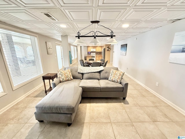 360 Frankies Rd, Vincent, AL 35178 - living area featuring baseboards, visible vents, an ornate ceiling, and light tile patterned floors