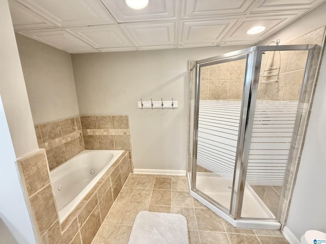 360 Frankies Rd, Vincent, AL 35178 - bathroom featuring a shower stall, baseboards, and a jetted tub