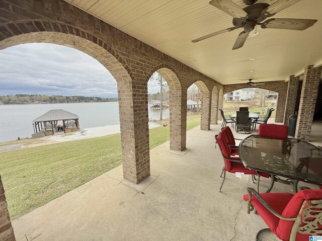360 Frankies Rd, Vincent, AL 35178 - view of patio / terrace with outdoor dining space, a gazebo, a water view, and ceiling fan