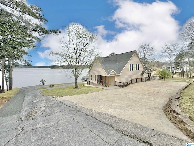 360 Frankies Rd, Vincent, AL 35178 - exterior space with a yard, a water view, and aphalt driveway