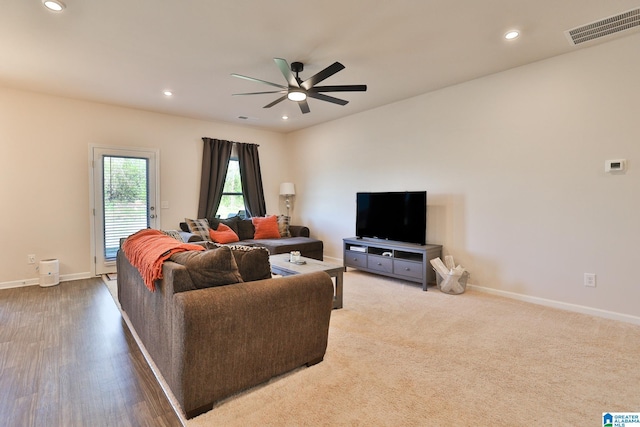 living room with baseboards, visible vents, ceiling fan, and recessed lighting