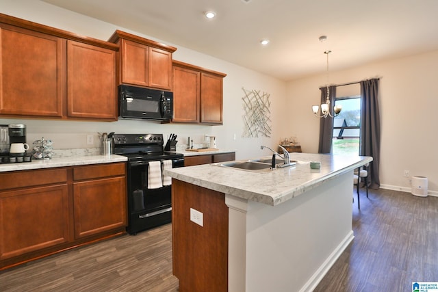 kitchen featuring a sink, light countertops, black appliances, and dark wood-type flooring