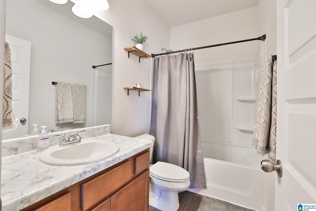 bathroom with toilet, shower / bath combination with curtain, vanity, and wood finished floors