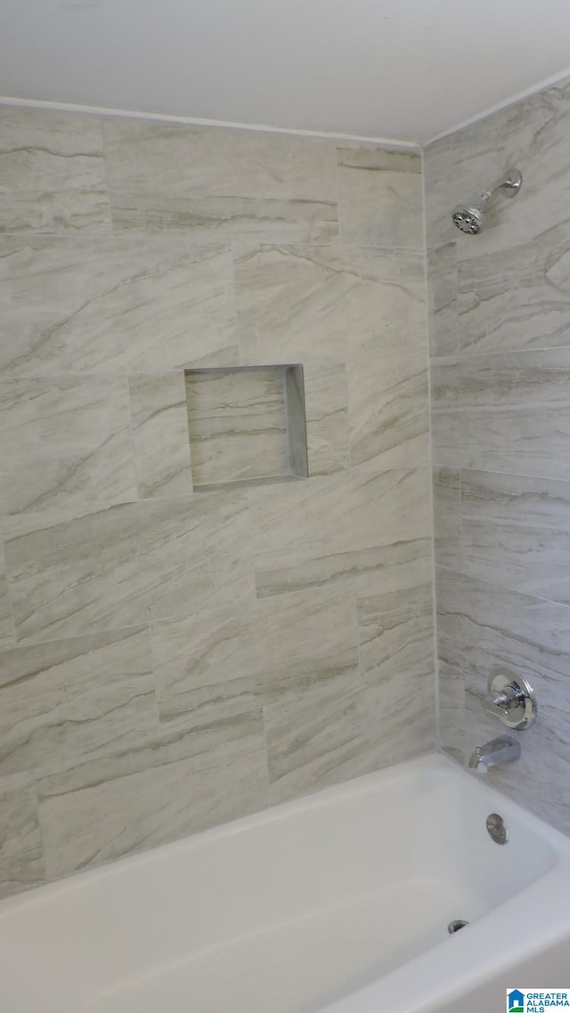 full bath with tub / shower combination