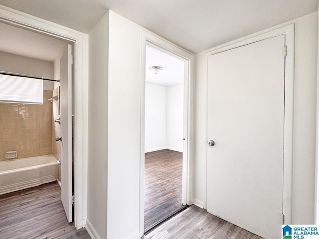 7709 7th Ave S, Birmingham, AL 35206 - hallway with baseboards and light wood-type flooring