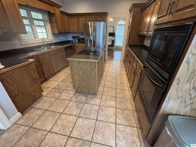 121 Grandview Rdg, Alpine, AL 35014 - kitchen with a sink, dark countertops, and black appliances