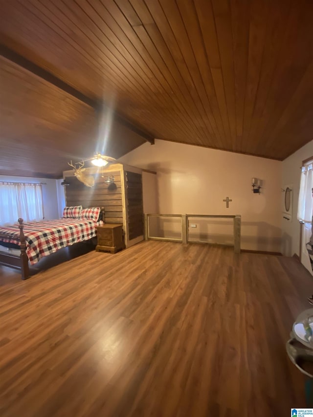 unfurnished bedroom featuring wood ceiling and wood finished floors