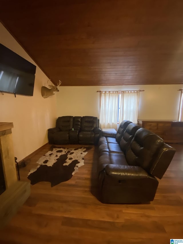 living room with wooden ceiling, vaulted ceiling, and wood finished floors