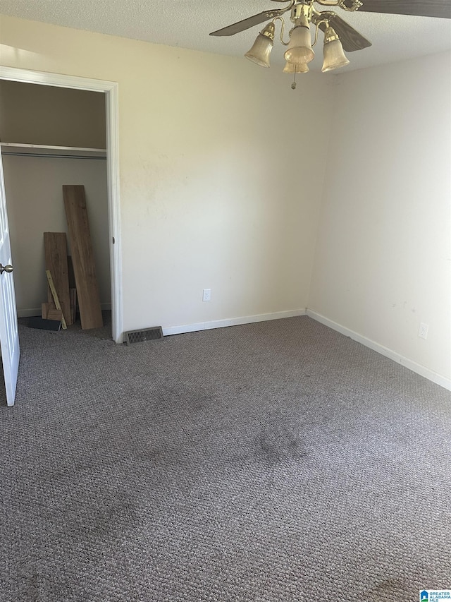 3825 County Road 715, Cullman, AL 35055 - unfurnished bedroom featuring baseboards, visible vents, carpet floors, and a textured ceiling