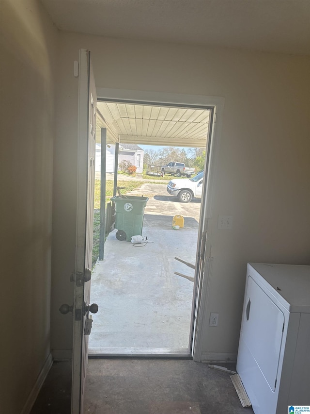 3825 County Road 715, Cullman, AL 35055 - doorway to outside with washer / clothes dryer and unfinished concrete floors